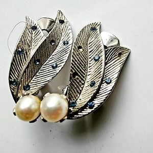 Sterling silver delicate leaves with blue gemstones throughtout, stones missing